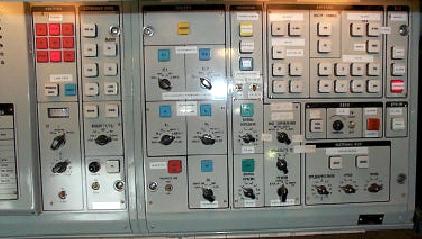 A control panel with switches, buttons, etc.