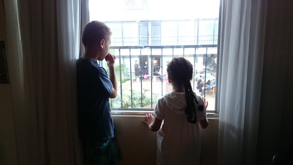Jacob and Jasmin looking out onto the courtyard from our room